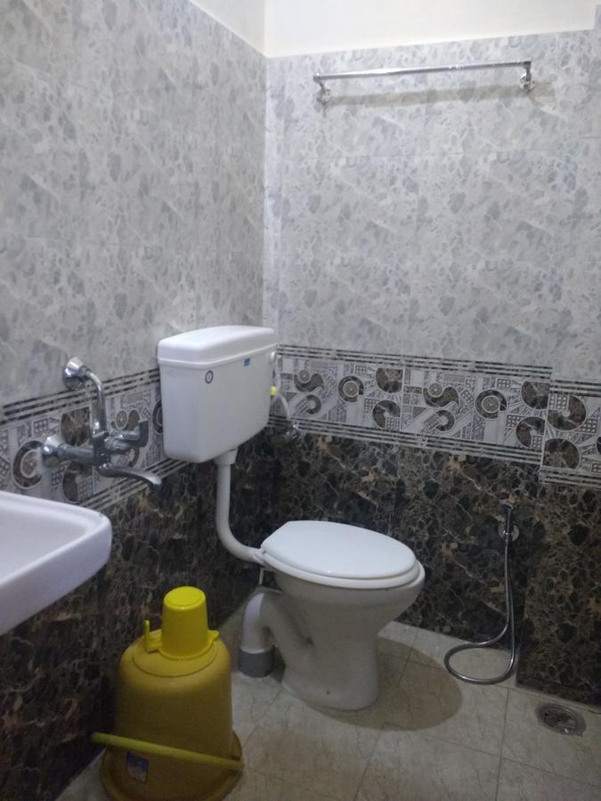 Addhuri Comforts Inn Maisur Oda fotoğraf